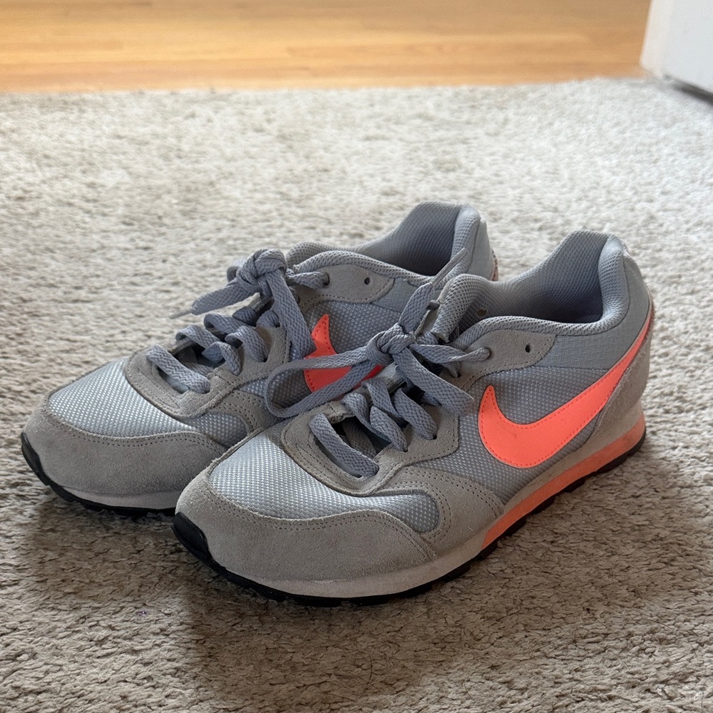 Nike Women’s Gray Sneakers with Coral Swoosh Accent